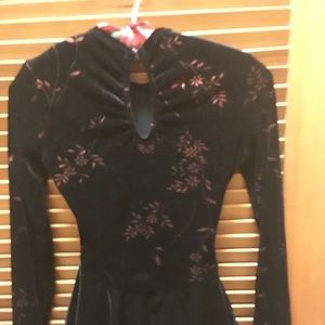 Black velvet with red floral figure skating dress